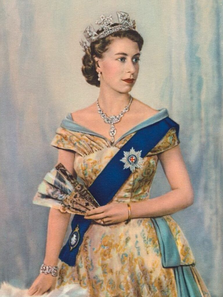 Portrait painting of Queen Elizabeth II in a gold gown with blue sash and elaborate crown
